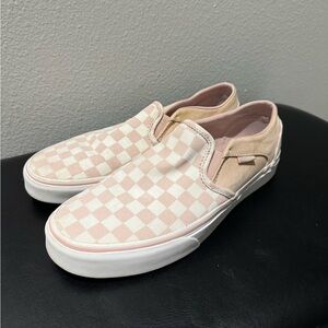 Women’s pink checkered slip on vans